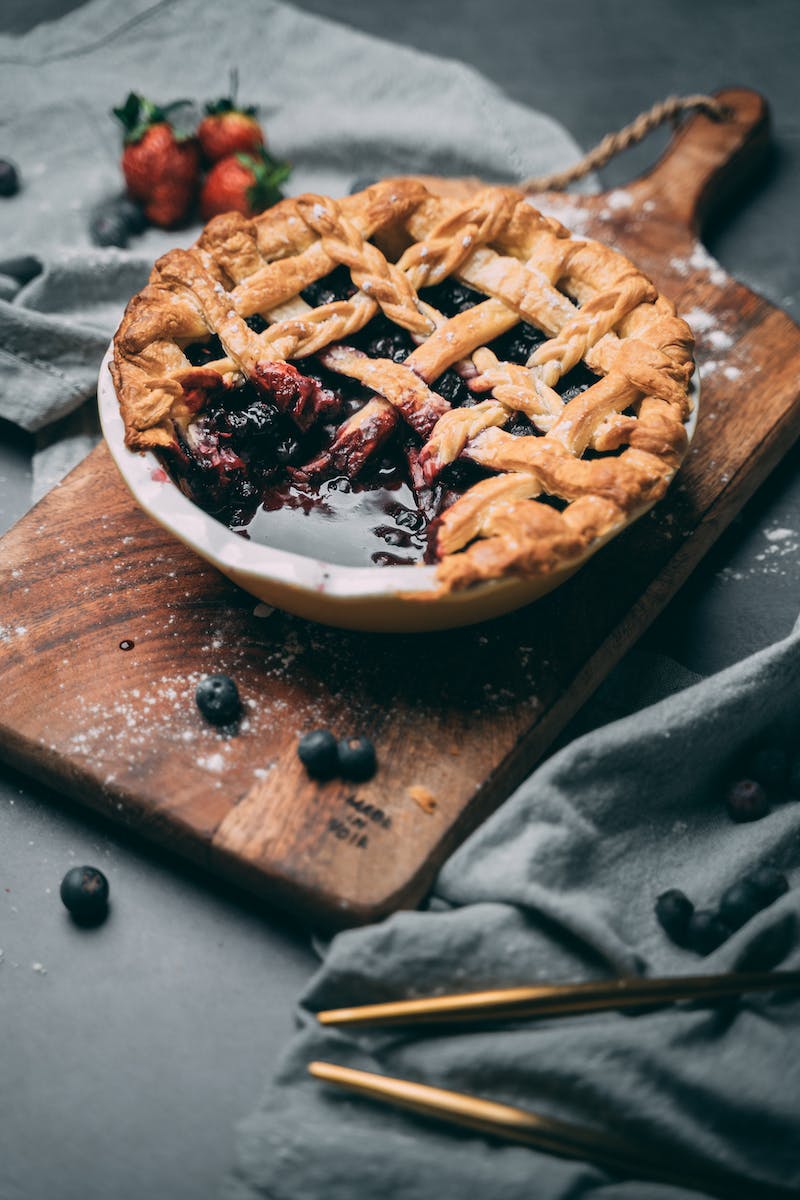 Brown Pie on Brown Wooden Table