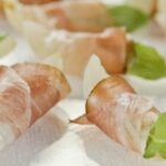 Savory Elegance: Grappa Poached Pears Wrapped in Speck Ham