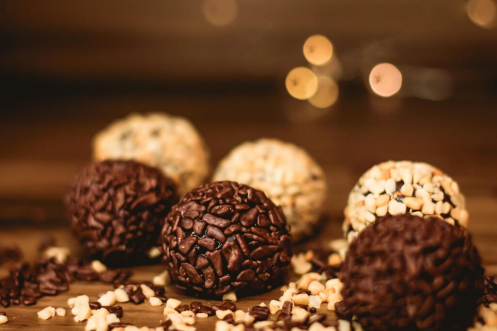 Round Chocolate Desserts on Wooden Table Top